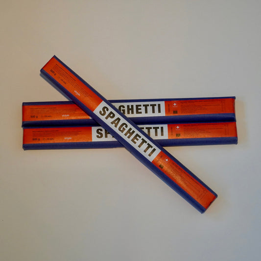 Three packages of spaghetti with red and blue labels on a white background