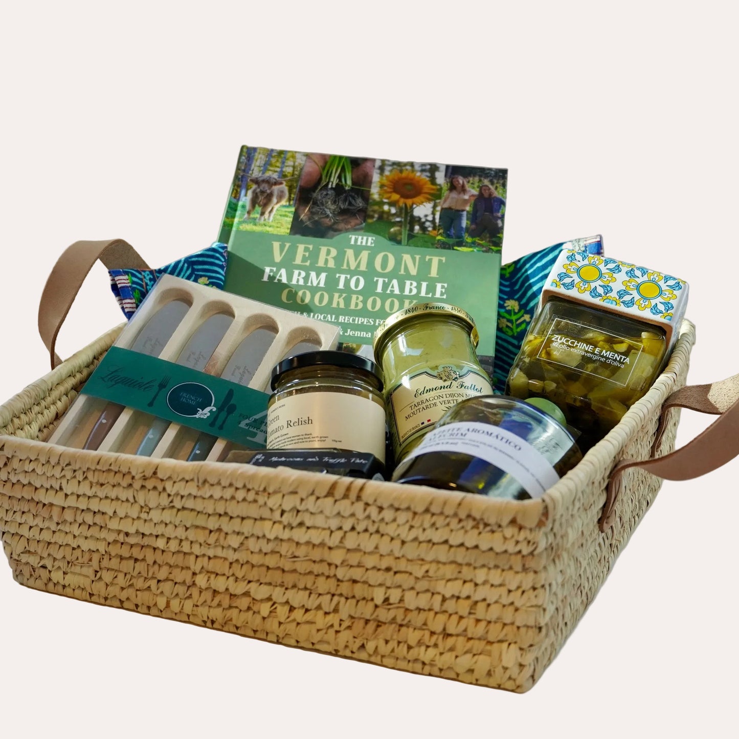 Gift basket with Vermont food products on a white background