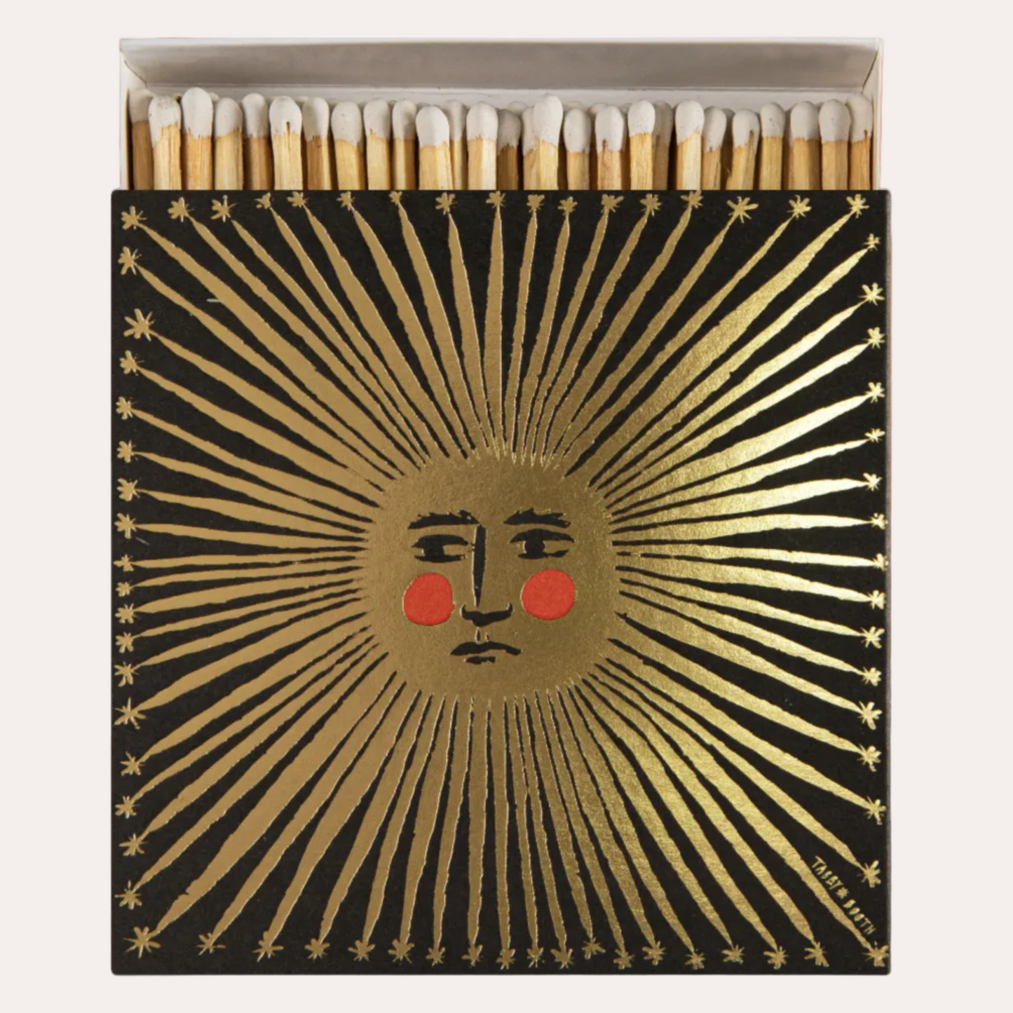 Matches with a sun design on the box against a white background