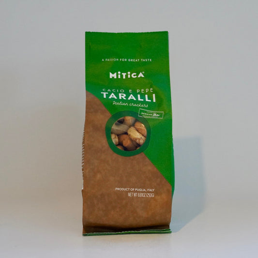 Green and brown package of Mitica Taralli on a white background