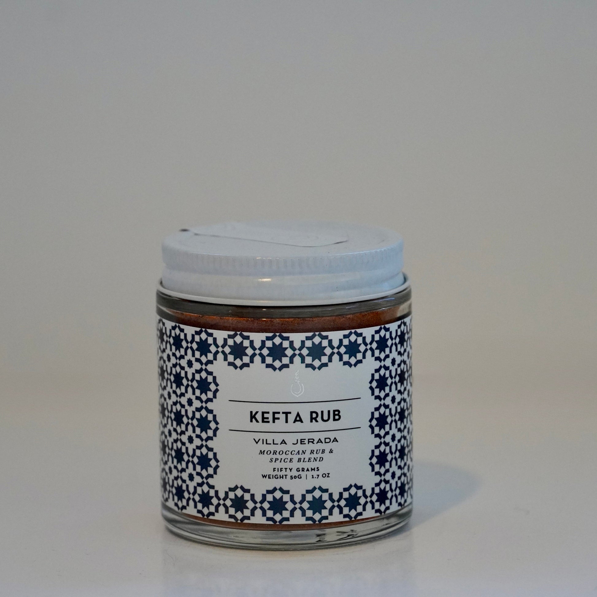 Jar of kefta rub with decorative label on a white background