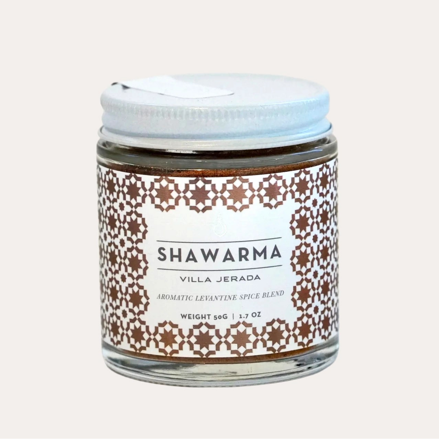 Jar of Shawarma spice blend with decorative label on a white background
