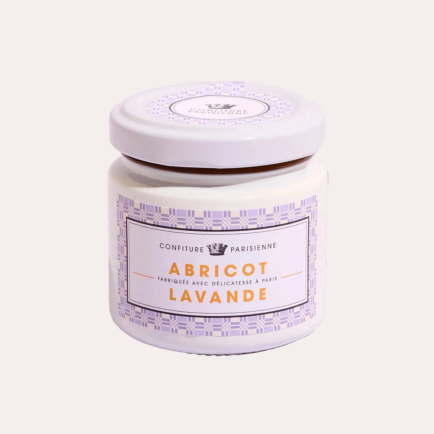 Jar of confiture with 'Abricot Lavande' label on a patterned purple background