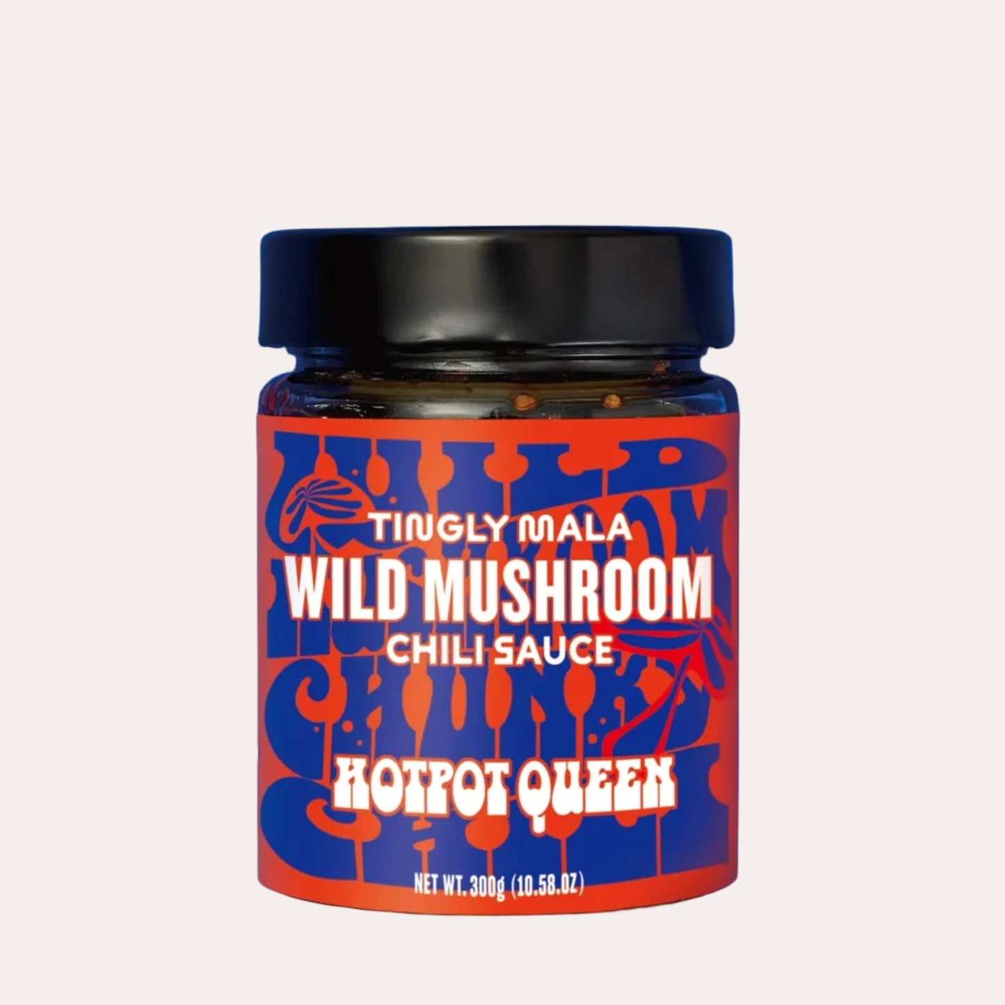 Jar of Wild Mushroom Chili Sauce with a blue background