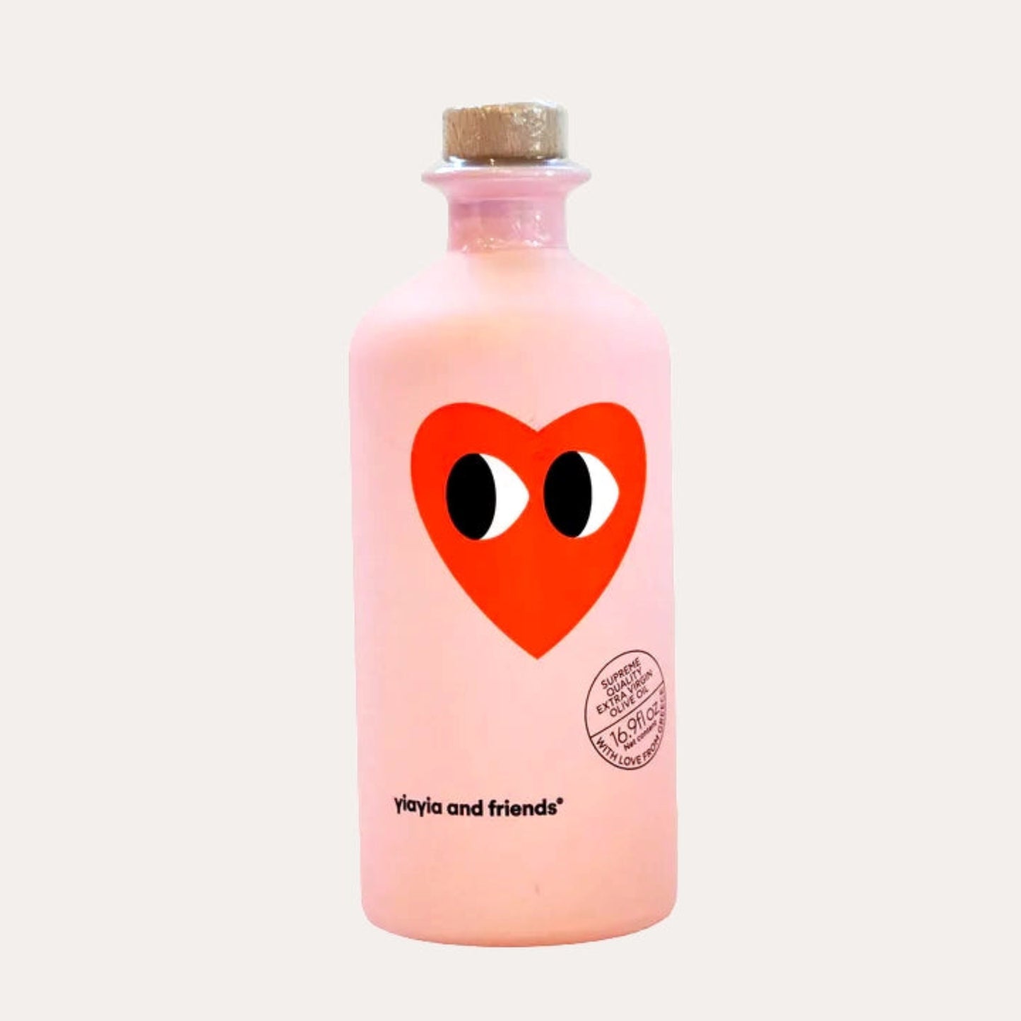 Pink bottle with a red heart design featuring eyes on a white background