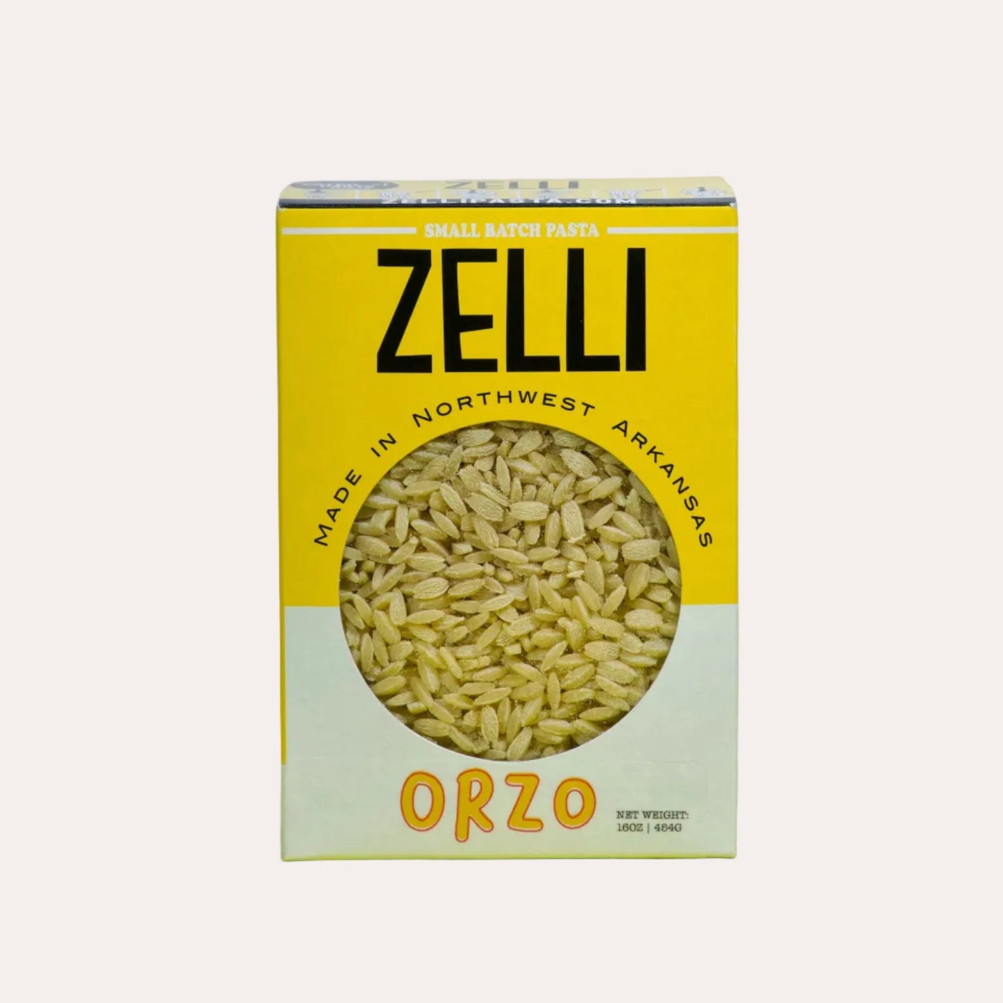 Zelli Orzo pasta box on a yellow background