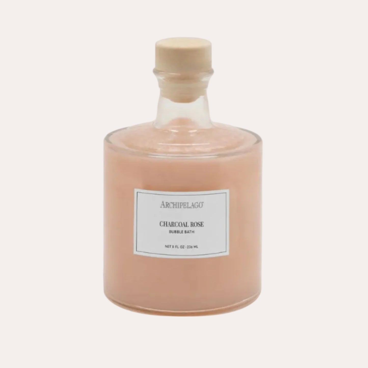 Bottle of Archipelago Charcoal Rose bubble bath on a white background