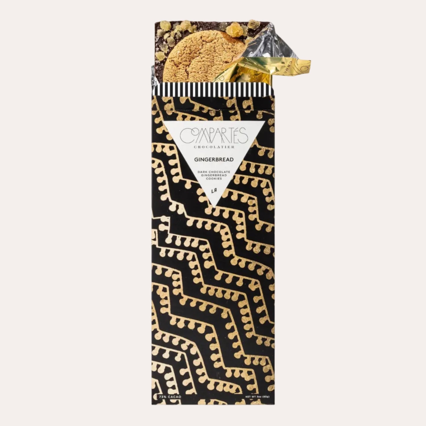 Packaged gingerbread cookies with decorative pattern on a white background