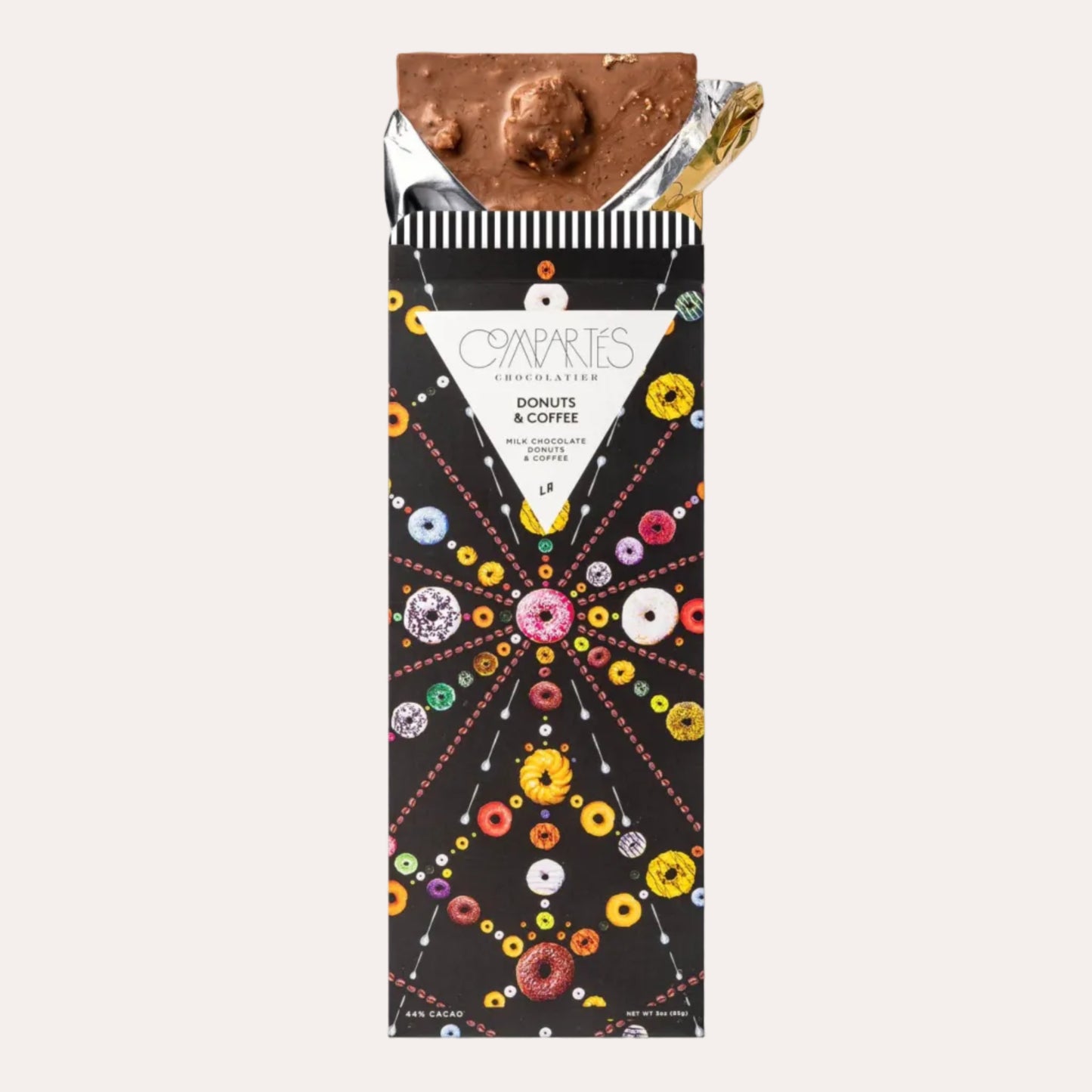 Chocolate bar with decorative packaging featuring colorful donut illustrations on a white background