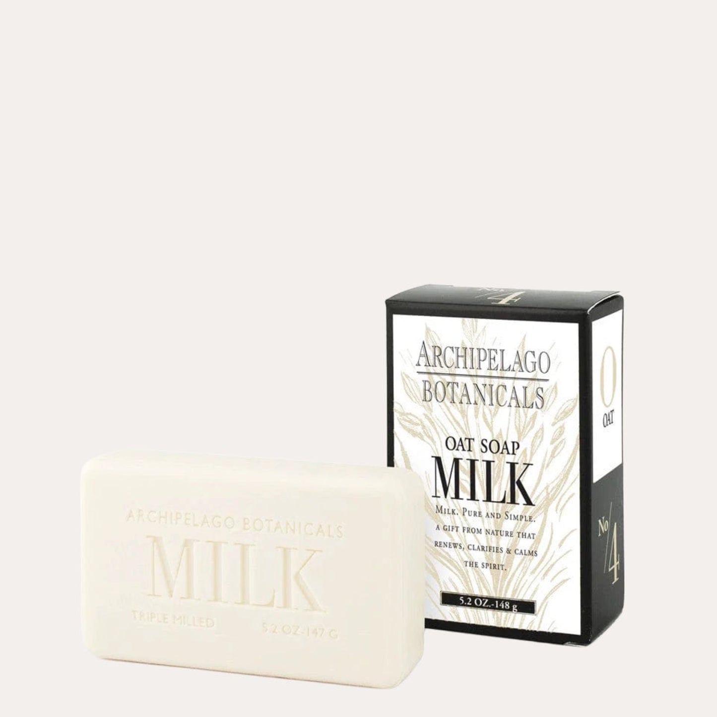Bar of Archipelago Botanicals Milk soap with packaging on a white background